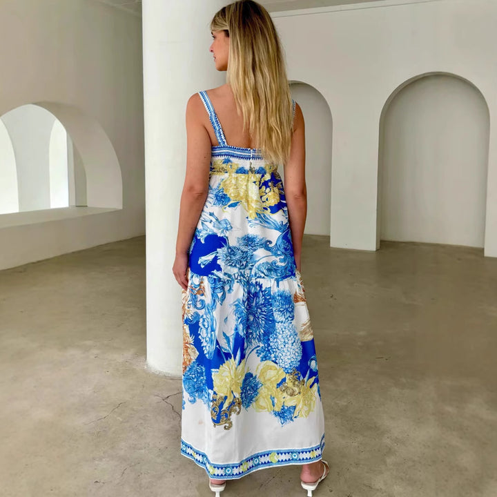 Kvinne maxi kjole med blomsterdesign og luftig passform