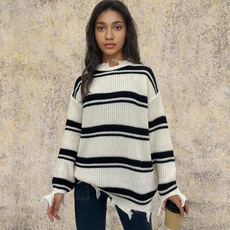Kvinnens oversized strikket genser med trendy stripe mønster og frynse detaljer Skjora