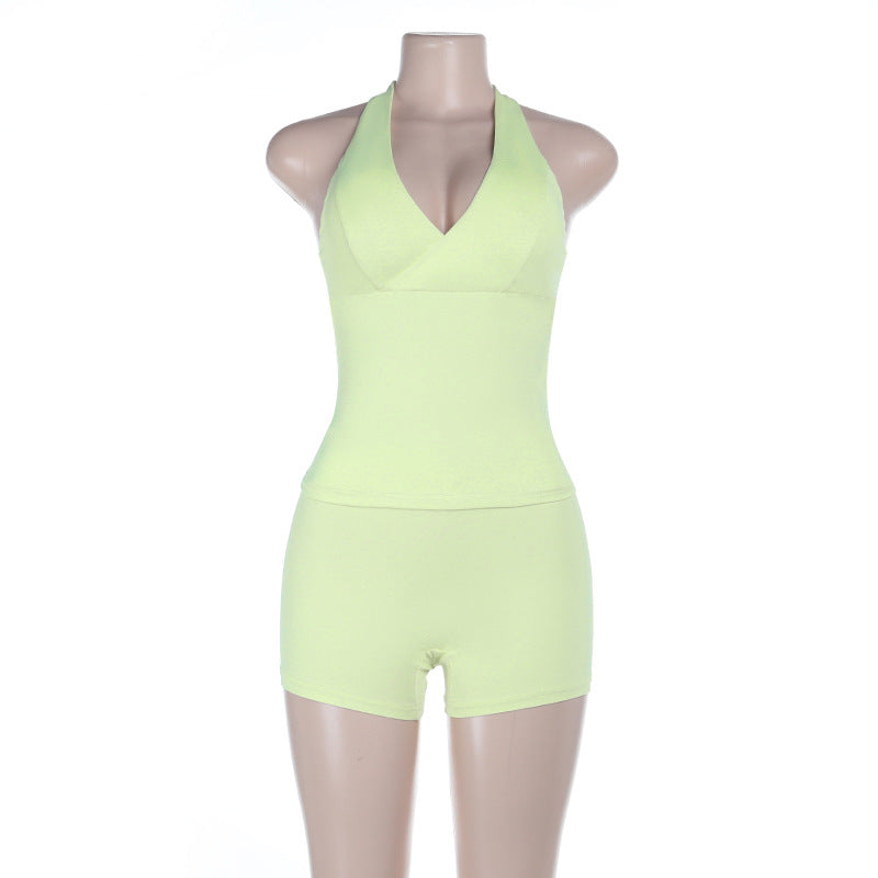 Dame sporty one-piece with deep V-neck and off-shoulder design Skjora