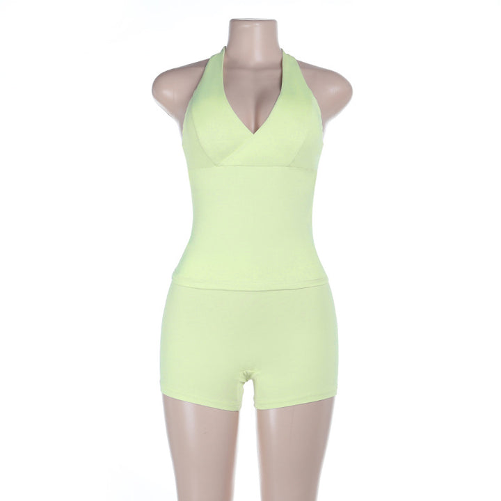 Dame sporty one-piece with deep V-neck and off-shoulder design Skjora