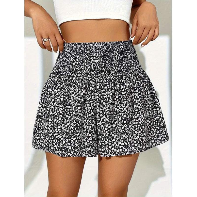 Dame shorts med elastisk midjebånd og blomsterdesign Skjora