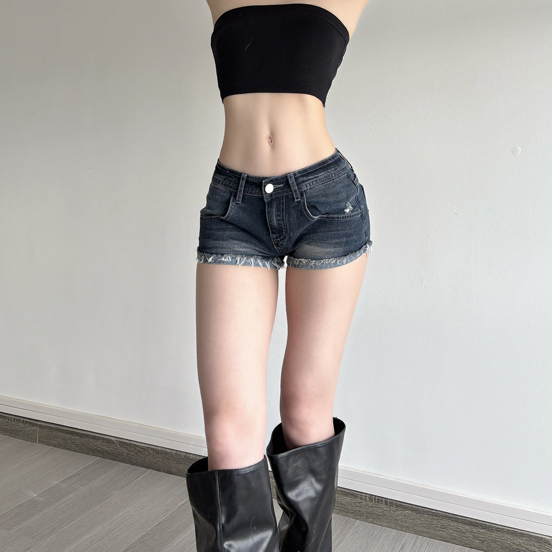 Dame denim-shorts med frynset kant skjorte