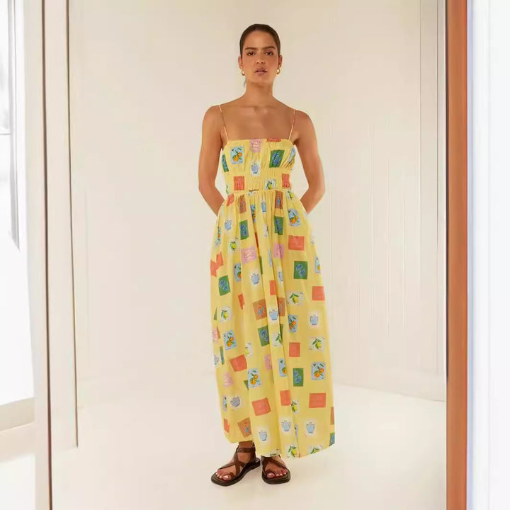 Kjole i maxi-stil for kvinner med elastisk midje og leken blomsterprint Skjora