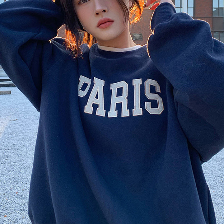 Dame avslappet sweatshirt med distinkte bokstaver Skjora