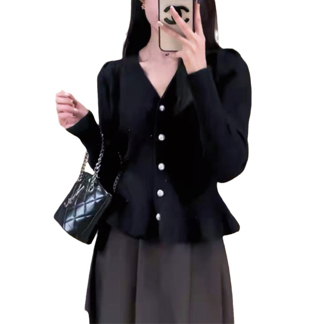 Dame cardigan med dekorative knapper og elegant snitt Skjora