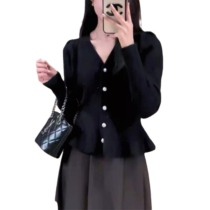 Dame cardigan med dekorative knapper og elegant snitt Skjora