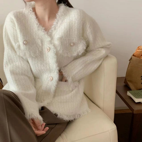 Kvinne cardigan med dekorative perler og frynsete detaljer Skjora