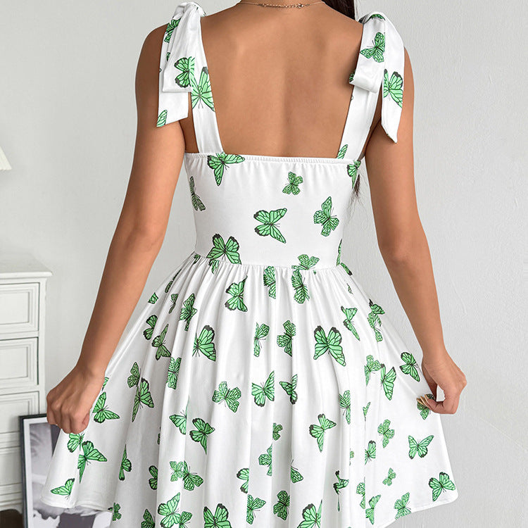 Dame sommerkjole med leken sommerfugl-design og justerbare stropper Skjora