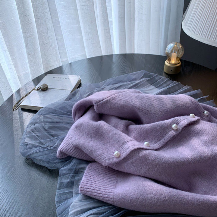 Dame cardigan med elegante perleknapper og moderne design Skjora