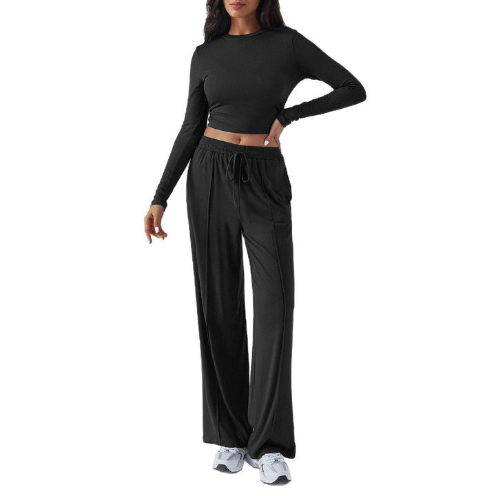 Damer avslappet lounge-sett med langermet crop-top og vid midje Skjora