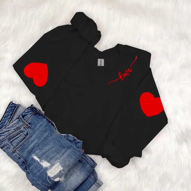 Dame sweatshirt med hjerte design og avslappet passform Skjora