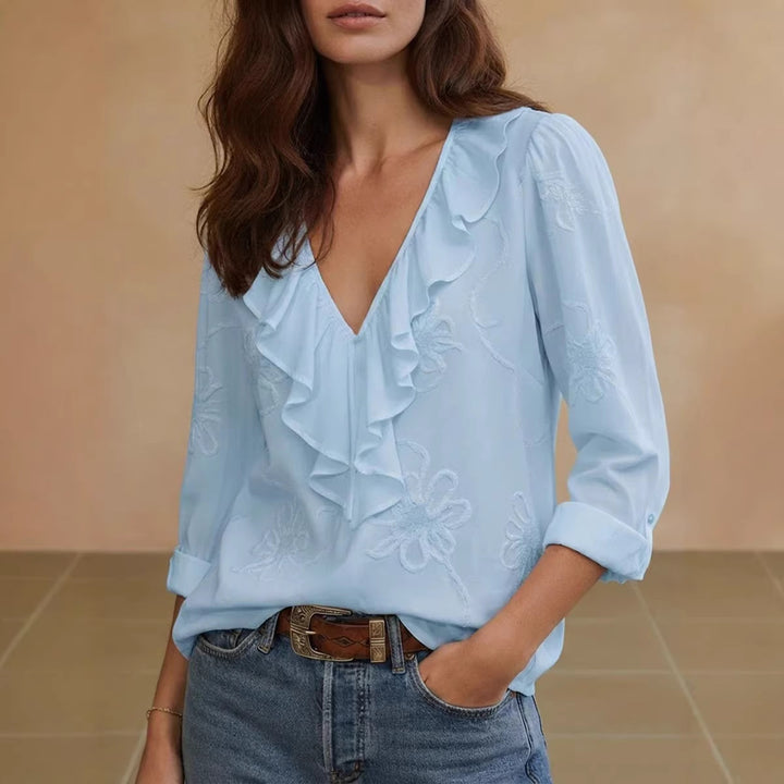 Dame elegant bluse med volanger og blomstrete broderimønster Skjora