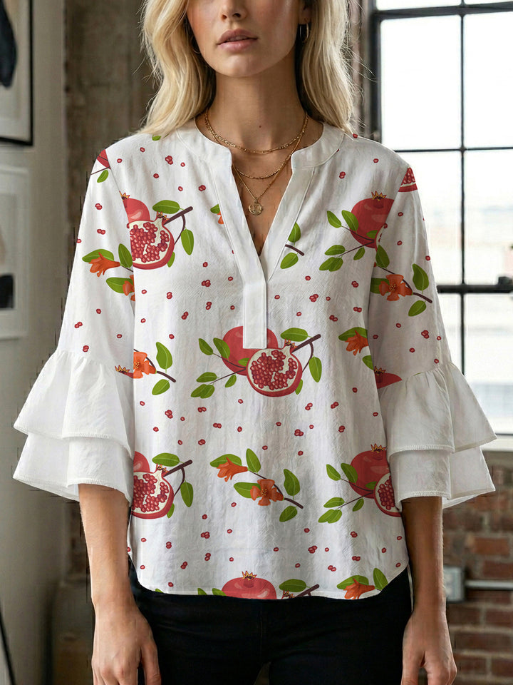 Dame bluse med voluminøse rysjermer og moderne motiv Skjora