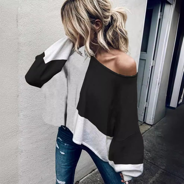 Dame trendy oversized genser med unikt snitt og kontrasterende fargeblokker Skjora