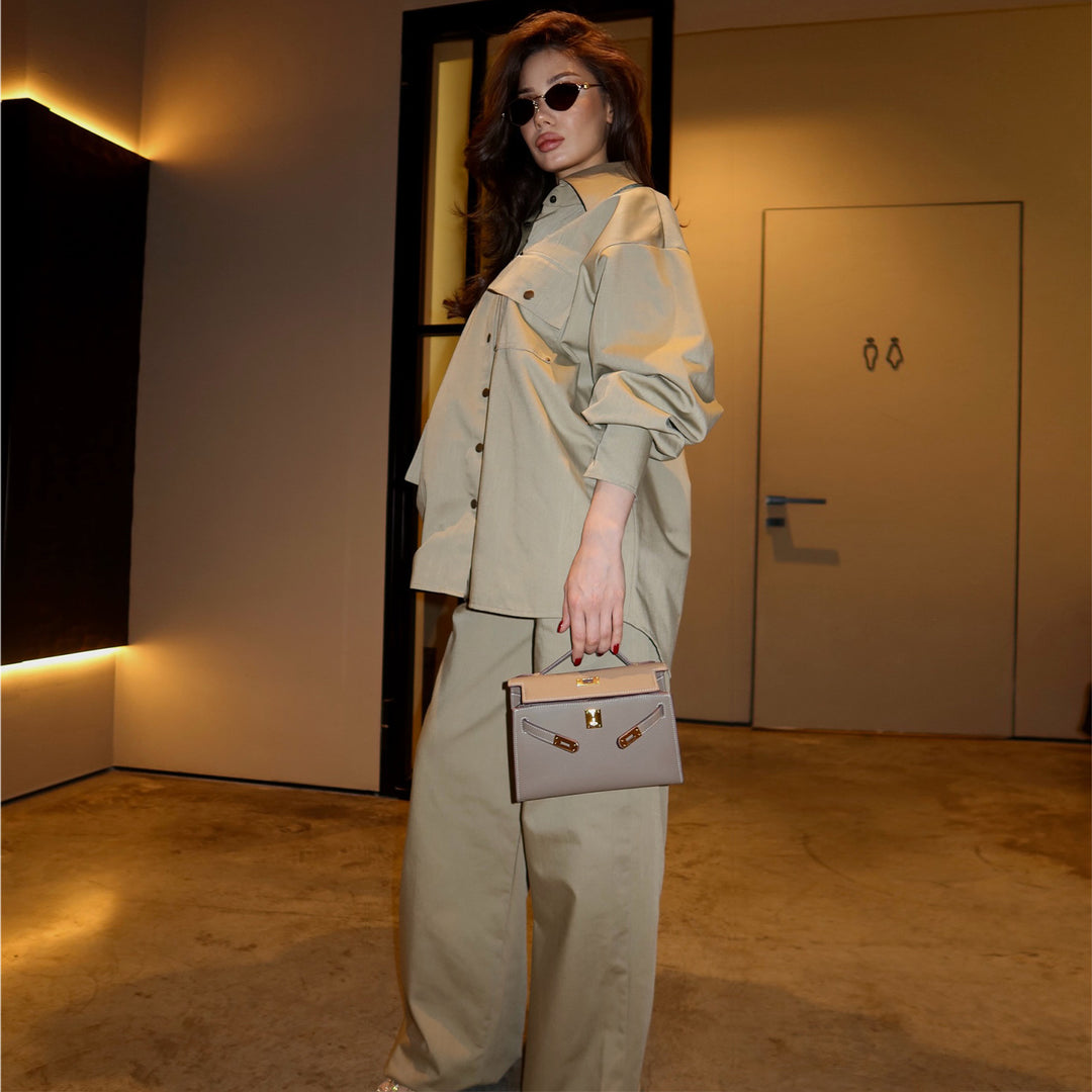 Kvinners oversized skjorte bluse drakt med trendy snitt og trykknapper
