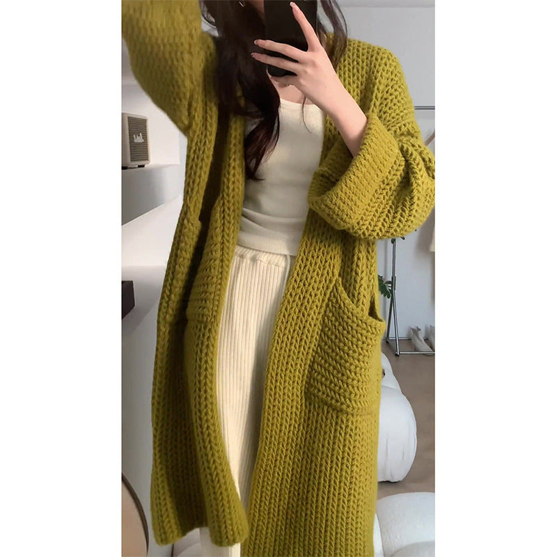 Kvinnens chunky strikket cardigan med åpne lommer og avslappet passform Skjora