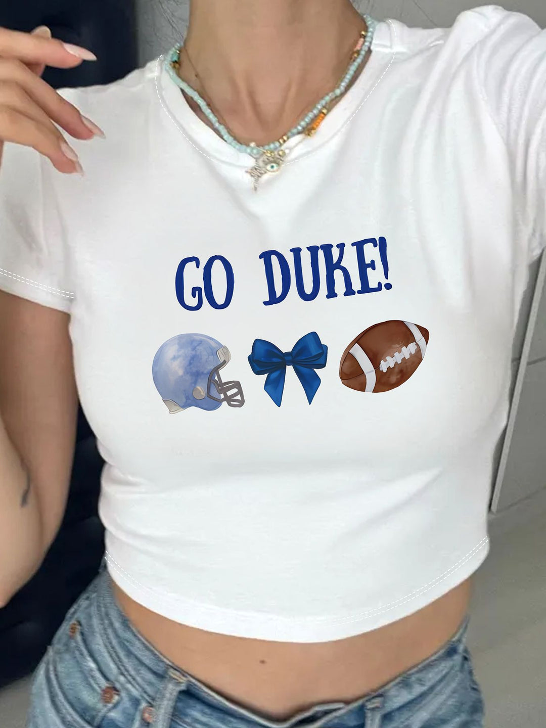 Damer Crop-T-skjorte med kreativt øye-motiv og turtrykk Skjora