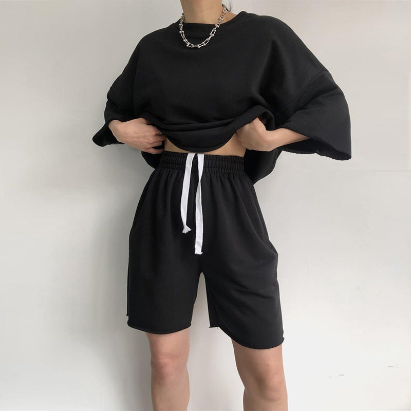 Kvinne Casual Oversized Fritidssett med Kortermet Topp og Løse Shorts Skjora