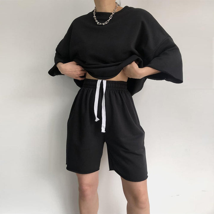 Kvinne Casual Oversized Fritidssett med Kortermet Topp og Løse Shorts Skjora