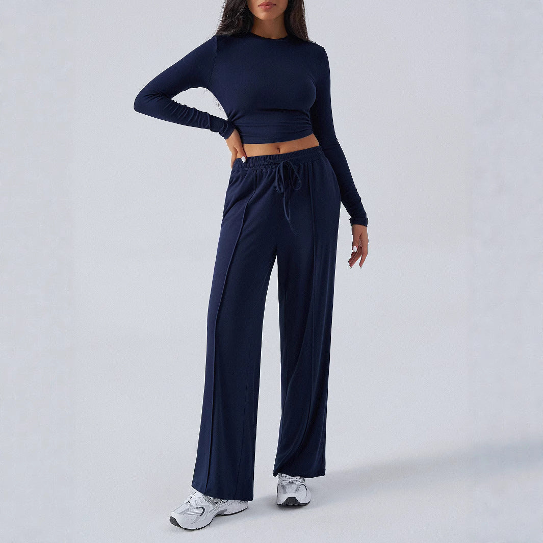 Damer avslappet lounge-sett med langermet crop-top og vid midje Skjora