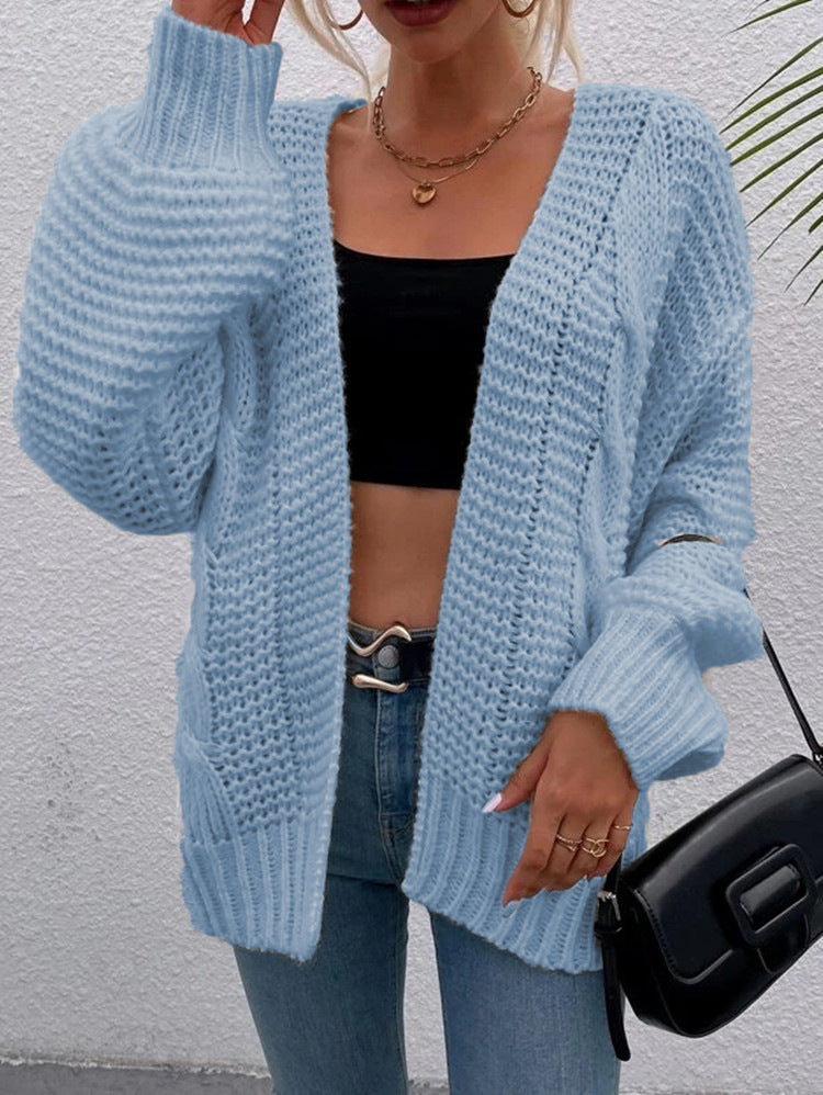 Kvinnens chunky strikket cardigan med komfortable åpne lommer og avslappet passform Skjora