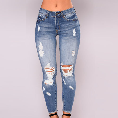 Dame jeans i avslappet brukt utseende med trendy rifter Skjora