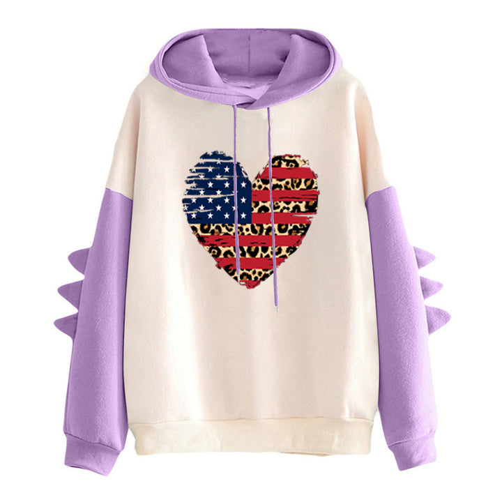 Kvinnes hoodie med unikt hjerte design og trendy detaljer Skjora