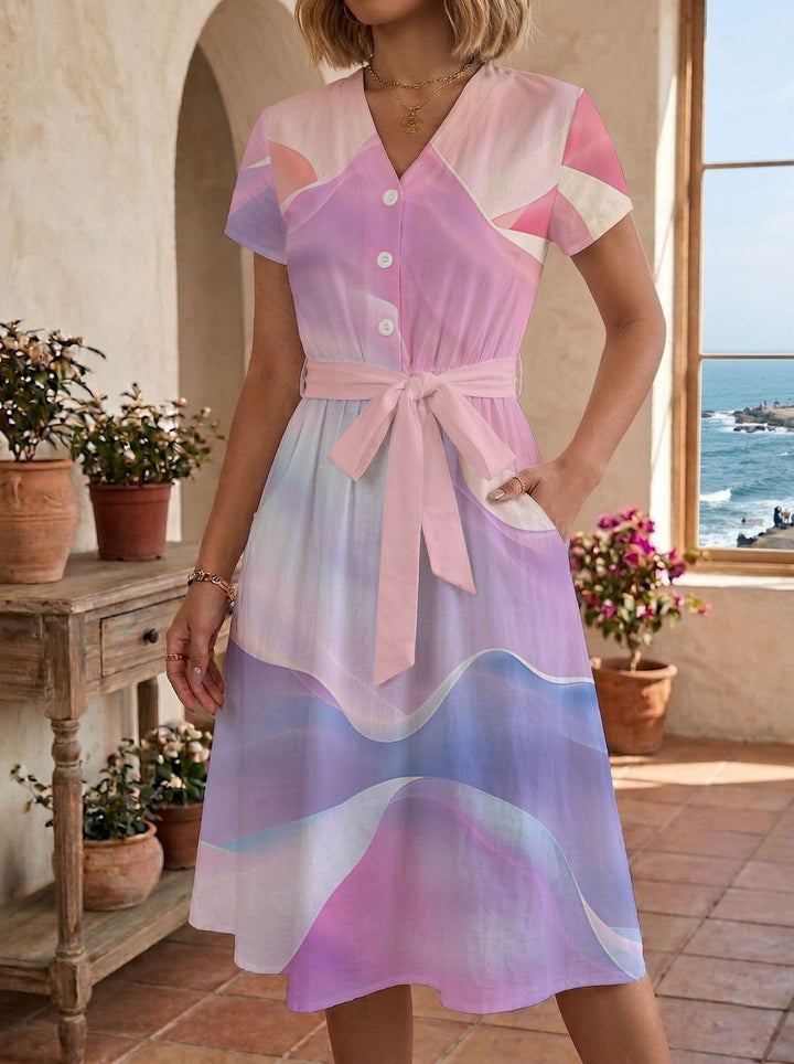 Damen Sommerliches Kleid mit taillierbarem Bindegürtel und floralem Muster Skjora