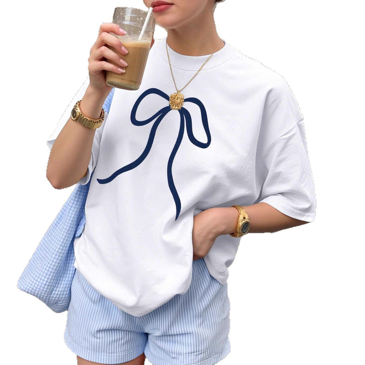 Damer oversized T-skjorte med elegant sløyfemotiv Skjora