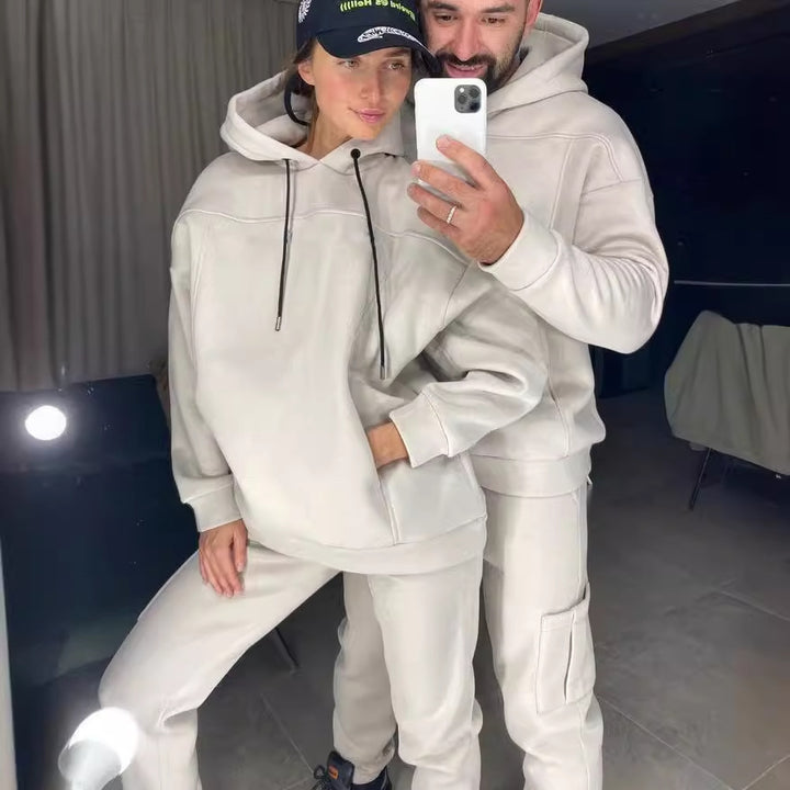 Women's relaxed hoodie and sweatpants set with practical pockets and drawstring