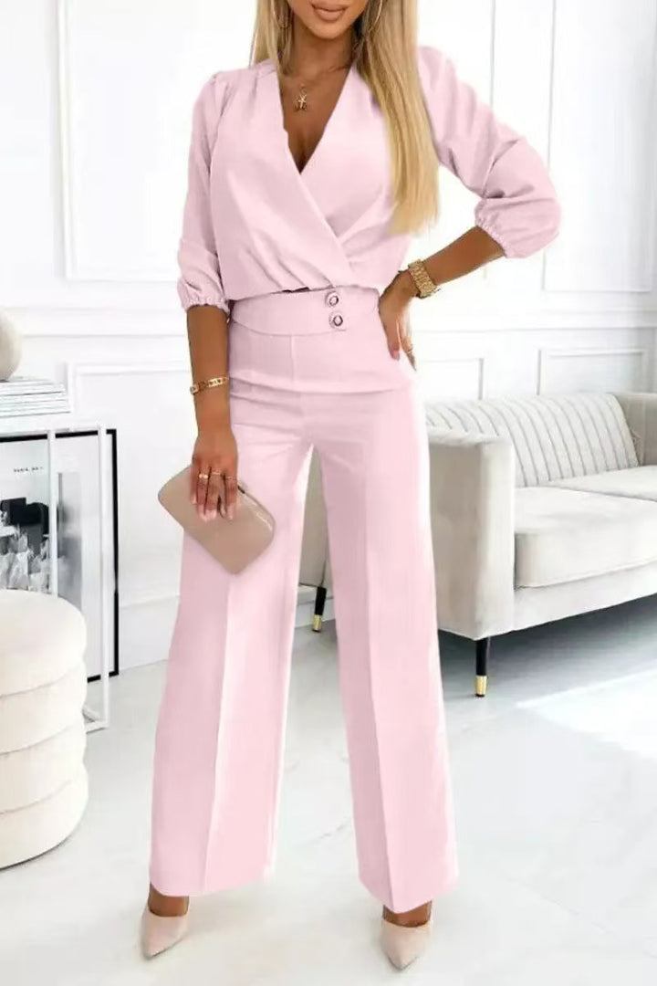 Kvinne elegant jumpsuit med omslagstopp og høyt liv ben Skjora