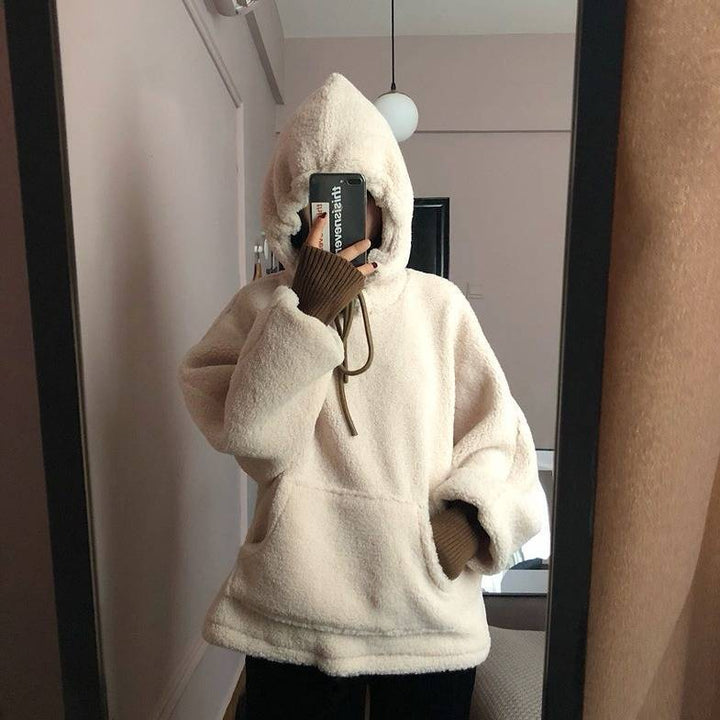 Damer's koselige oversized hettegenser med front kengurulomme og elastiske mansjetter Skjora