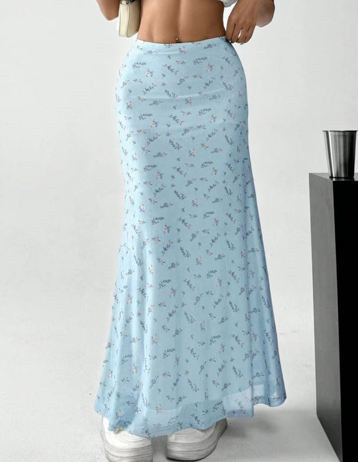 Dame Langrock med florale motiver og flytende snitt Skjora