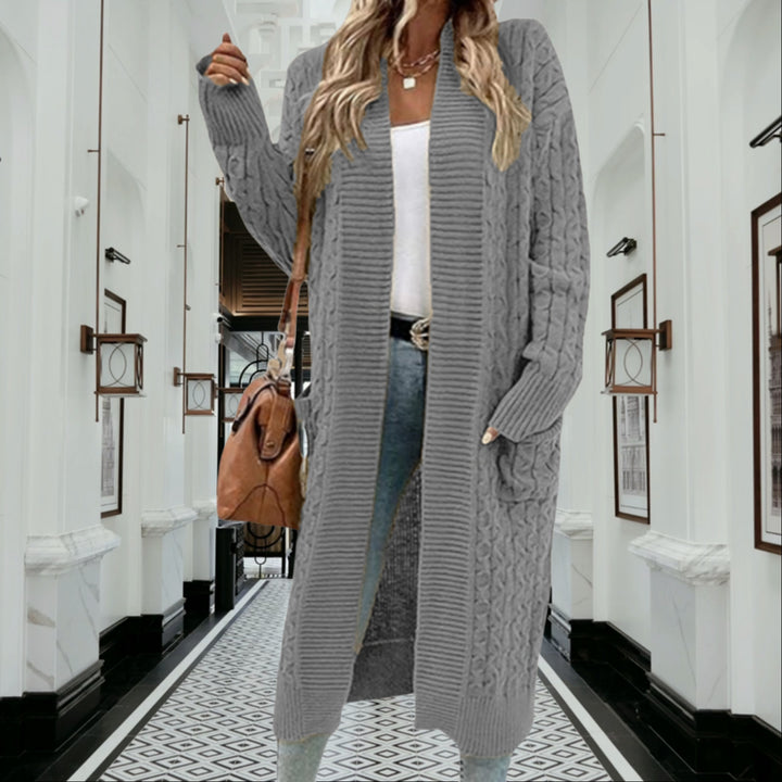 Kvinnes chunky strikket cardigan med åpen design og praktiske lommer Skjora