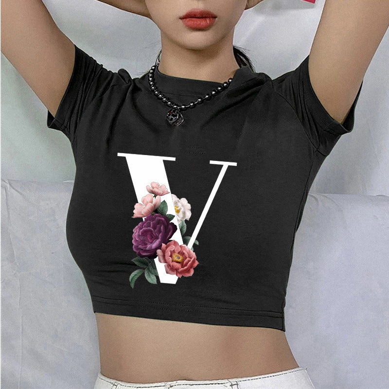 Dame cropped T-skjorte med blomstrede initialdesign Skjora