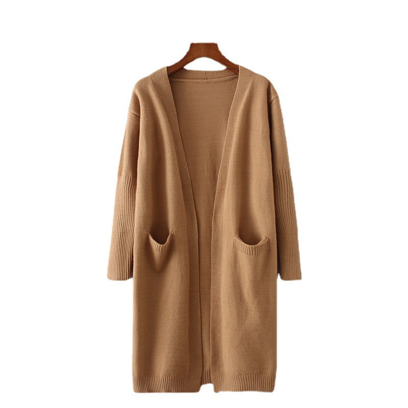 Kvinnes chunky strikket cardigan med praktiske lommer og avslappet snitt Skjora