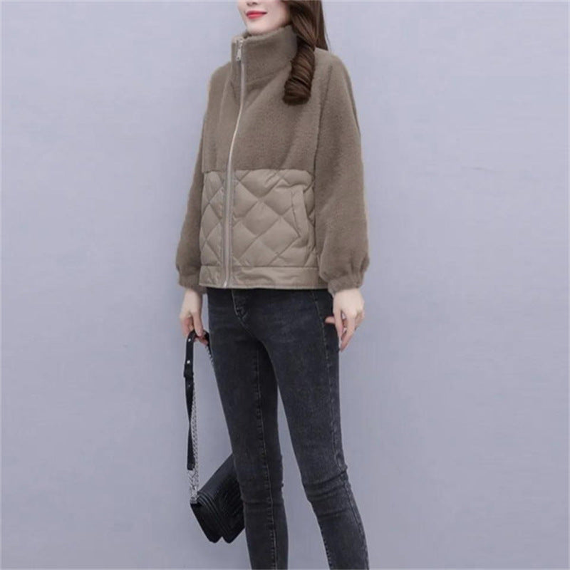 Kvinnens allsidige fleecejakke med quilted detaljer og elegante mansjetter Skjora