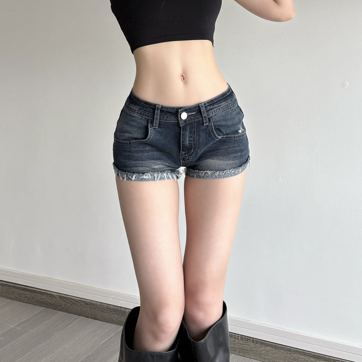 Dame denim-shorts med frynset kant skjorte