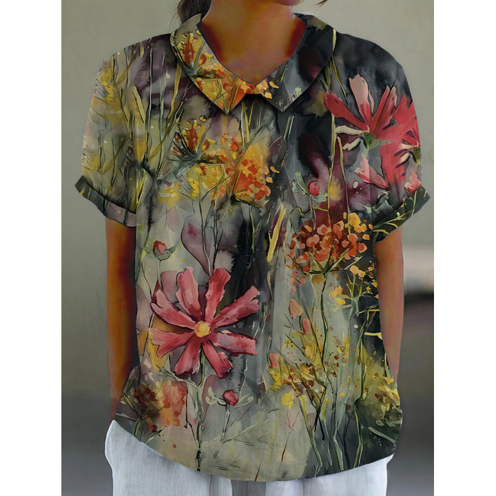 Dame kortermet bluse med florale accenter og klassisk krage Skjora