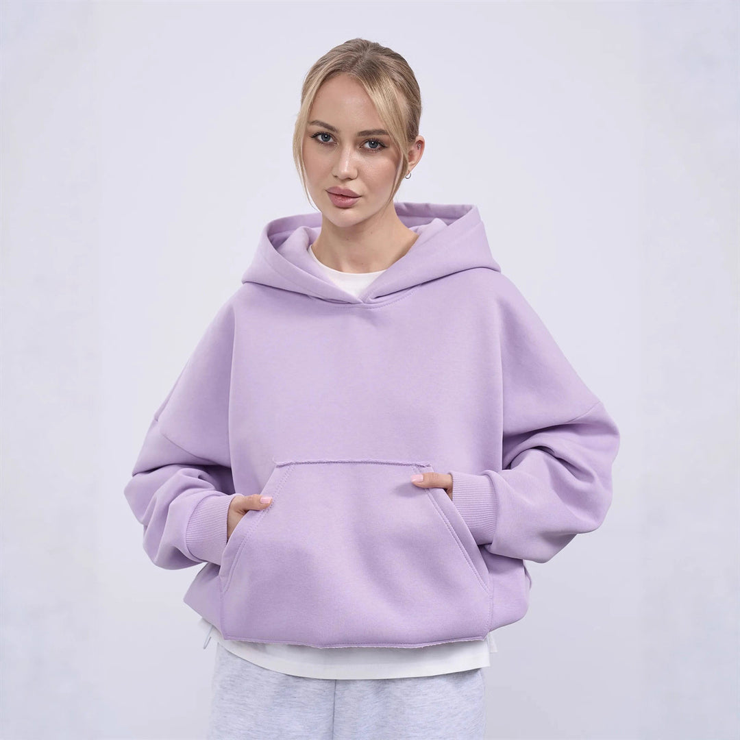 Dame oversized hettegenser med sidelommer og avslappet passform Skjora