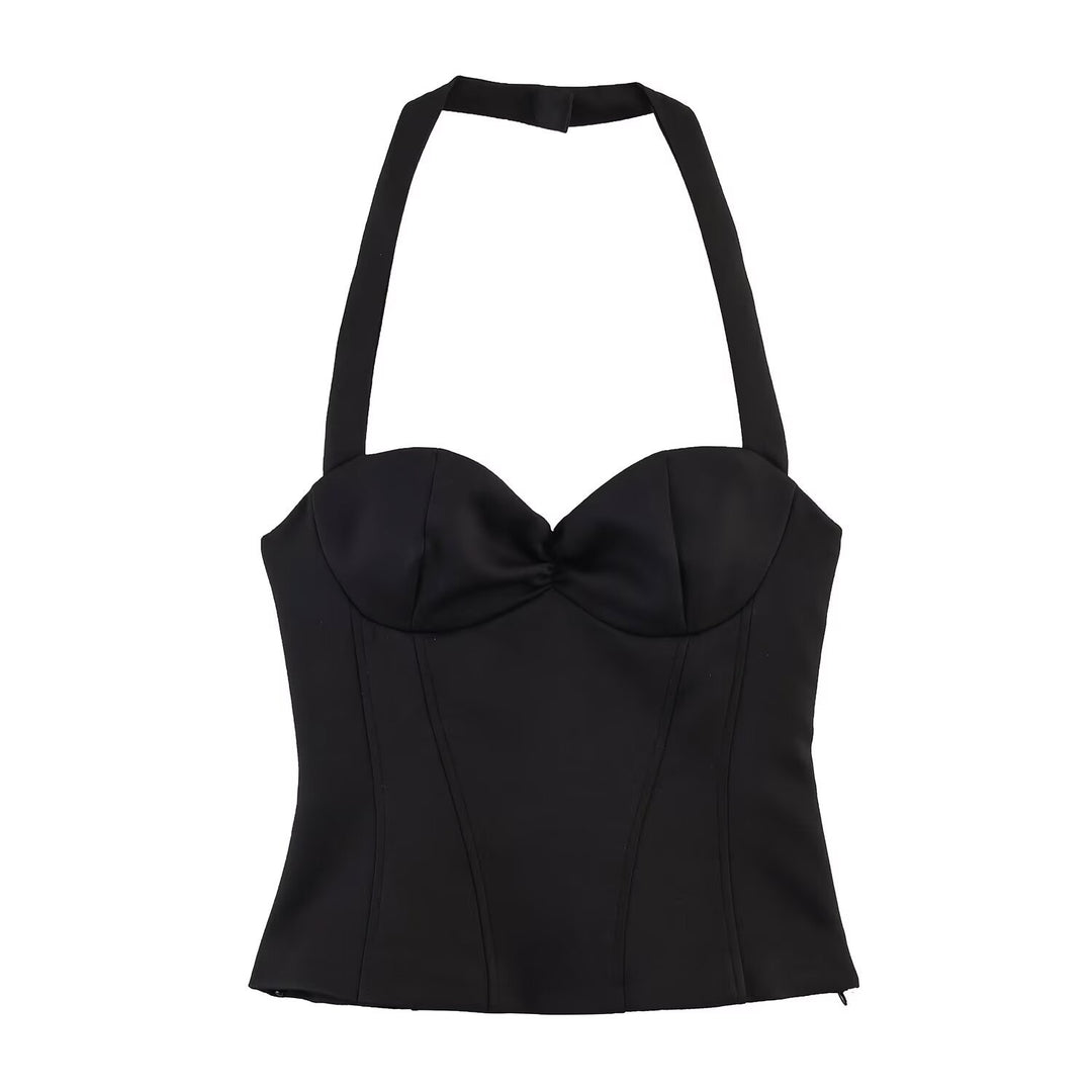 Damekombinasjon av kort topp og shorts Skjora