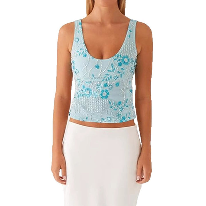 Damescouture topp med blomstret rhinestonesdesign og tettsittende snitt