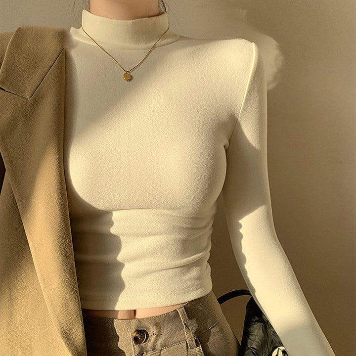 Kvinners langermet crop top med høy krage og tettsittende snitt