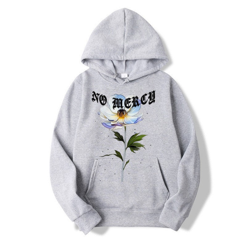 Damegenser med blomsterprint og fremtredende tekst Skjora