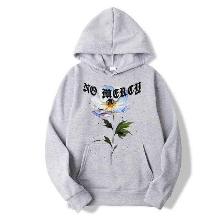 Damegenser med blomsterprint og fremtredende tekst Skjora