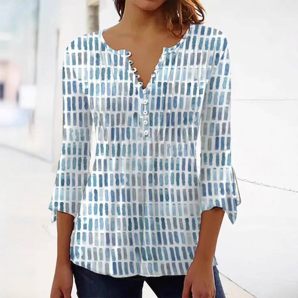 Damebluse i moderne grafisk design med knappe detaljer Skjora