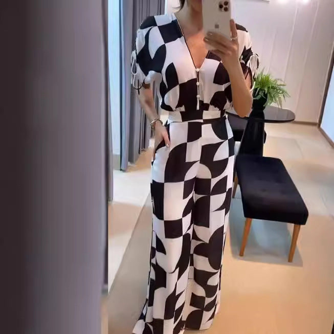 Damer Moderne Jumpsuit med grafisk mønster og elegante ermer Skjora