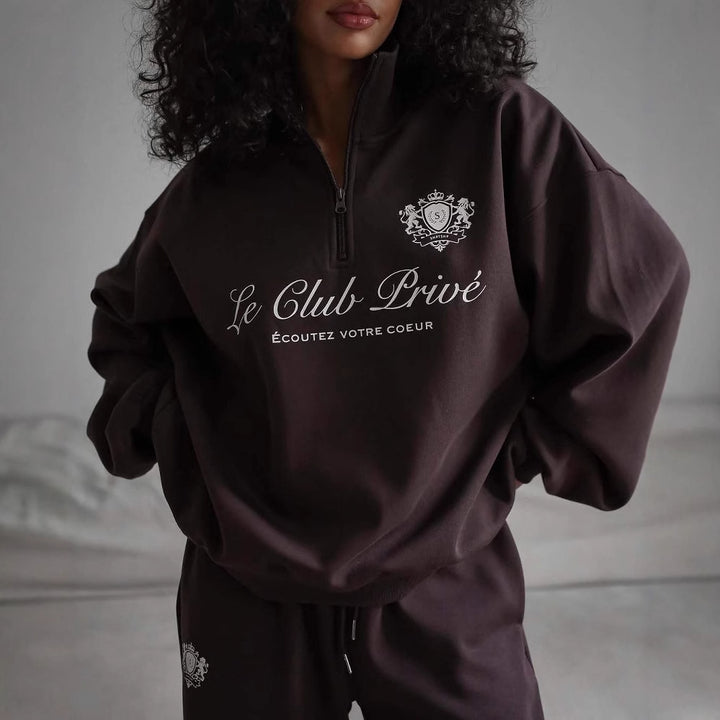 Dame avslappet genser med halvlukking og eksklusivt trykk Skjora