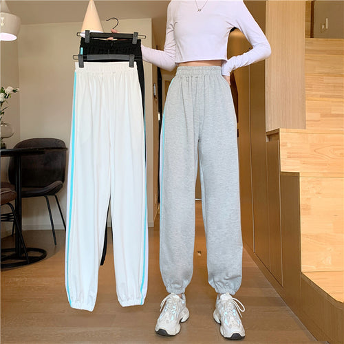 Dame sporty joggebukser med stilige sideninsert Skjora