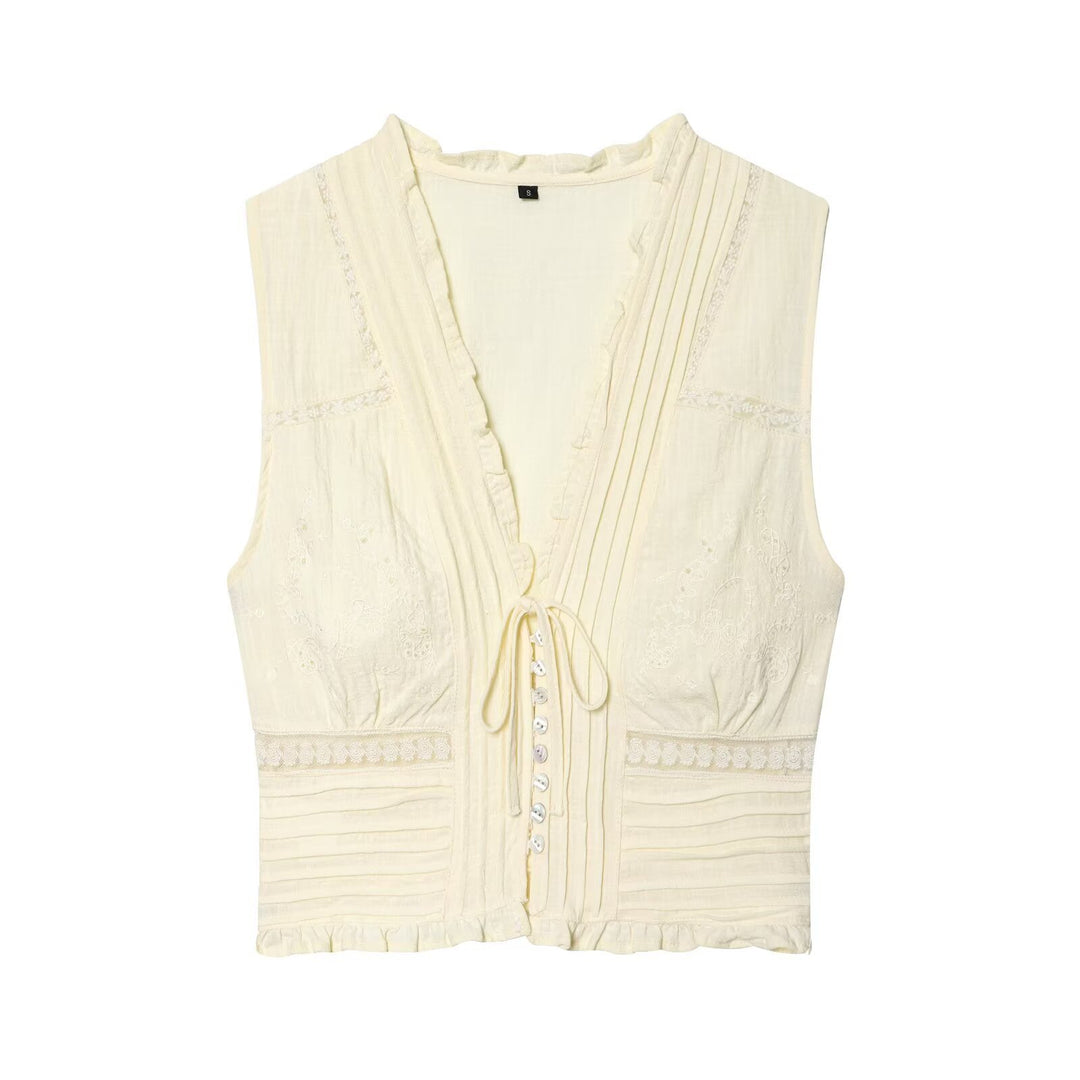 Dame bluse skjorte med fin drapering og dekorative knappedetaljer Skjora